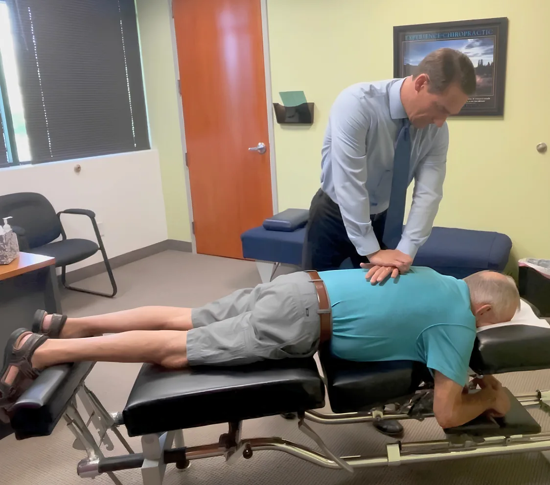 Dave receiving a gentle chiropractic adjustment at Plymouth Spine and Health Center in Plymouth